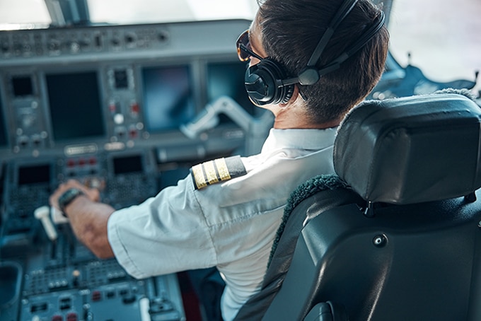 airplane pilot in cockpit pilot in an airplane cockpit