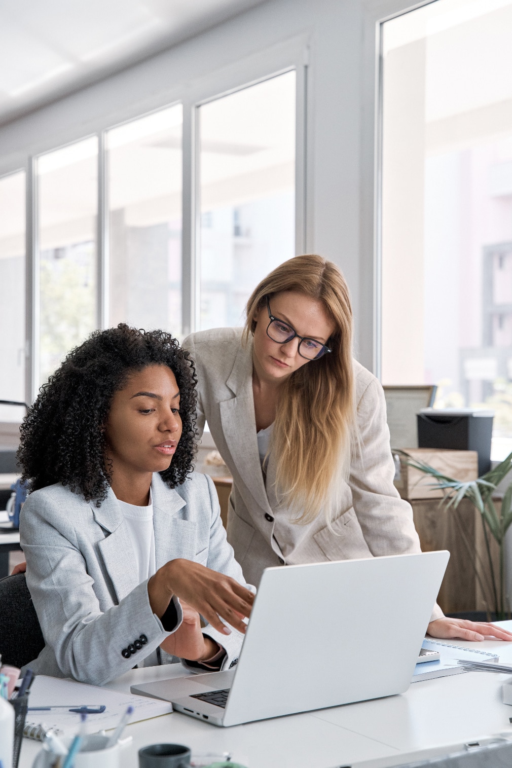 women working on a computer