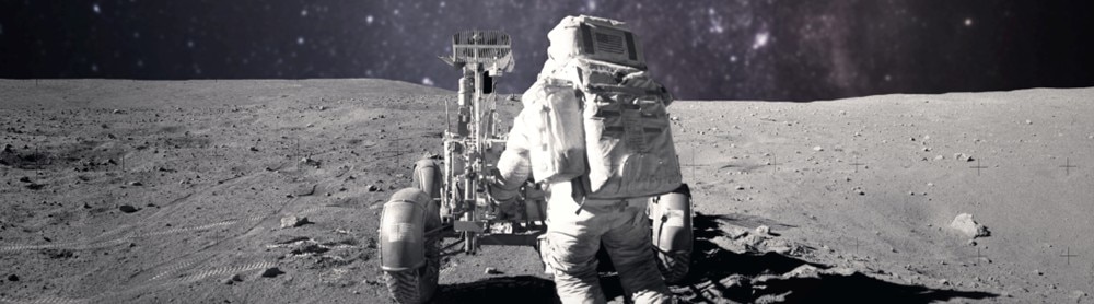 Astronaut on moon with rover