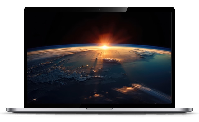 View of the sun on the horizon seen on a laptop device in an office setting