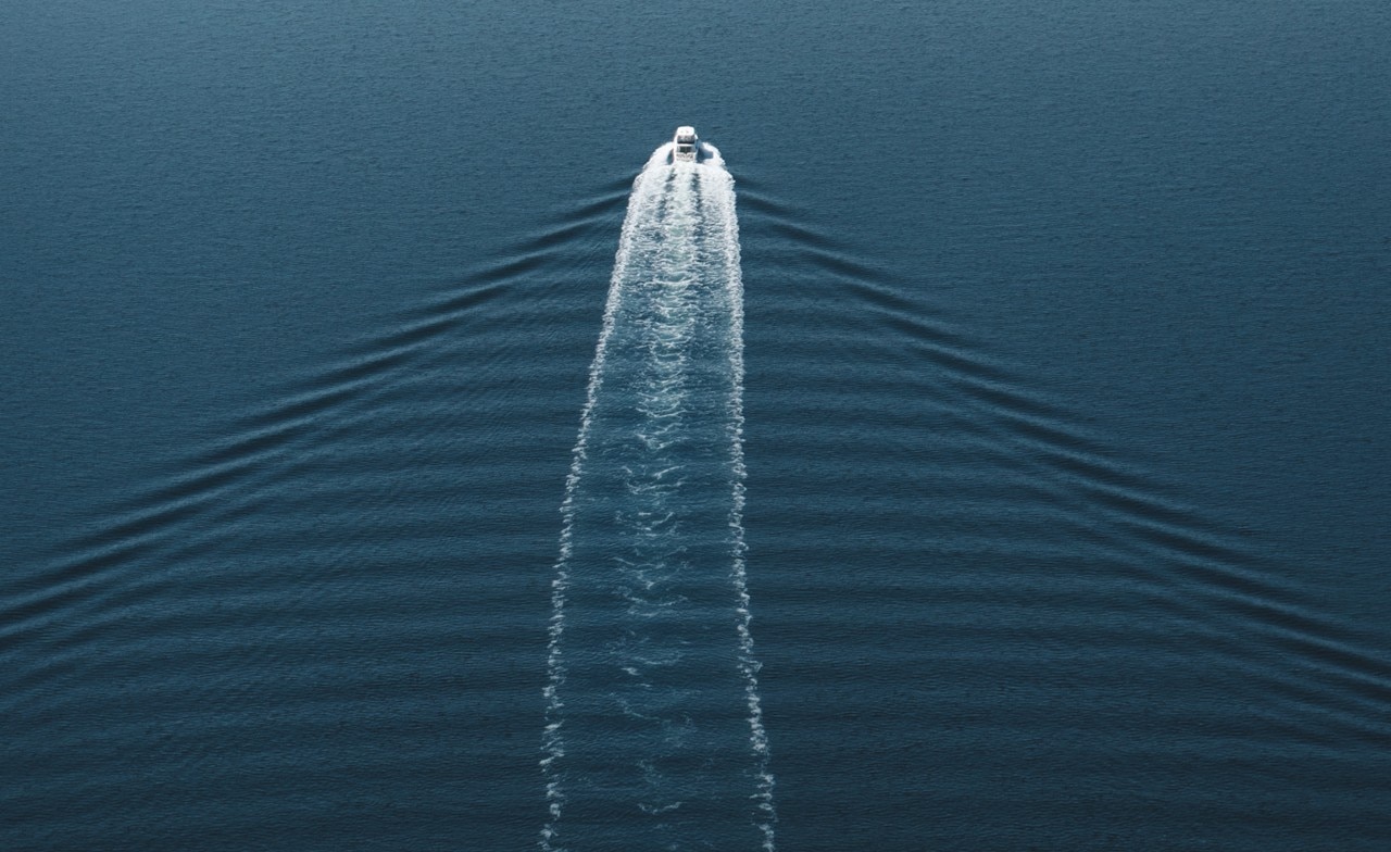Speed boat in distance Speed boat in distance
