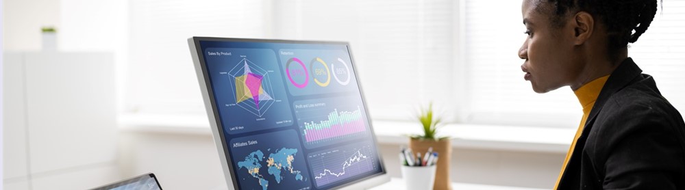 Data analyst working on computer