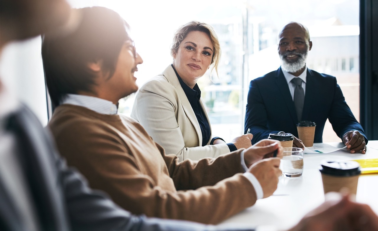 CGI consultants sat in meeting room CGI consultants sat in meeting room