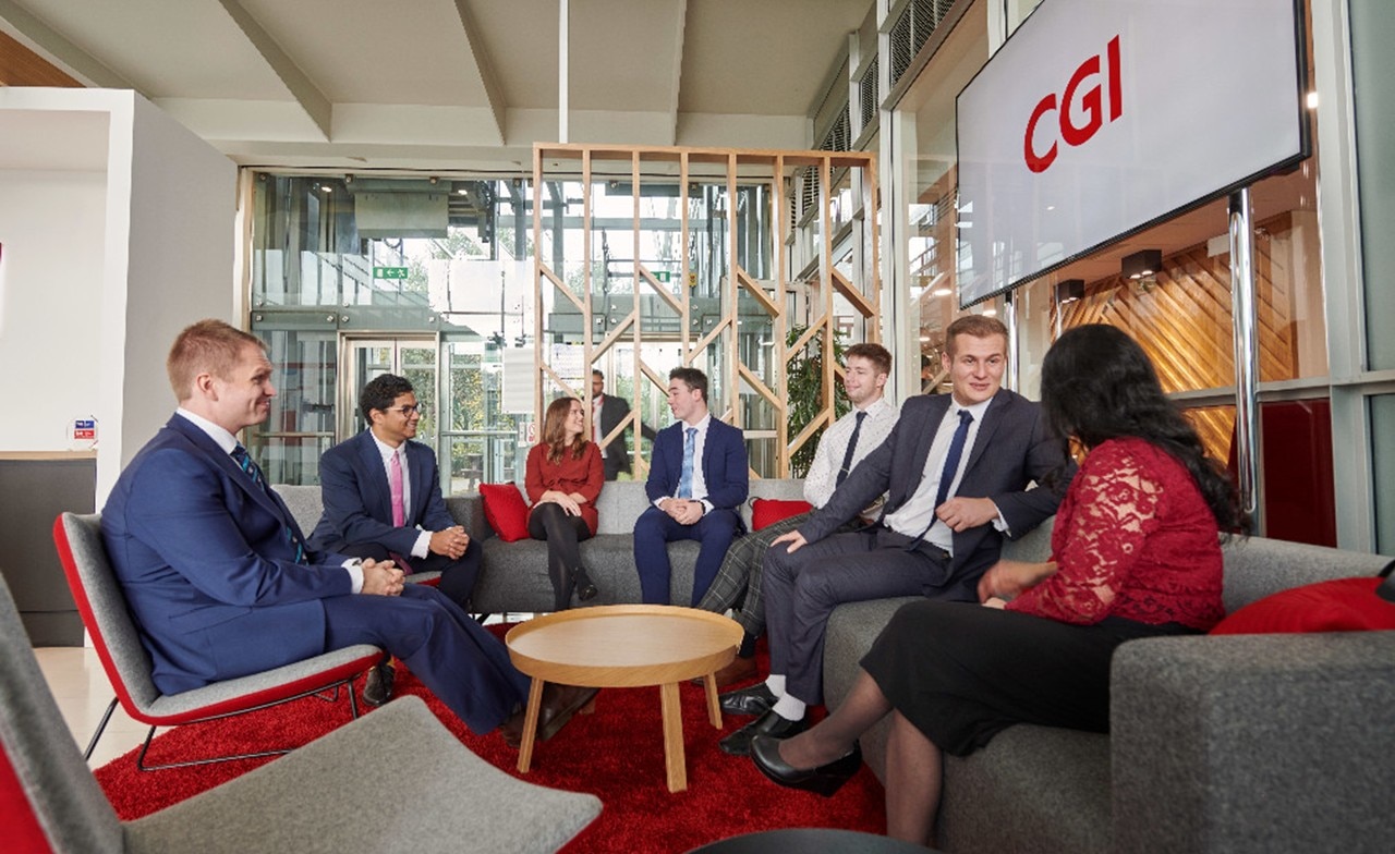 CGI Partners sat on sofa in office
