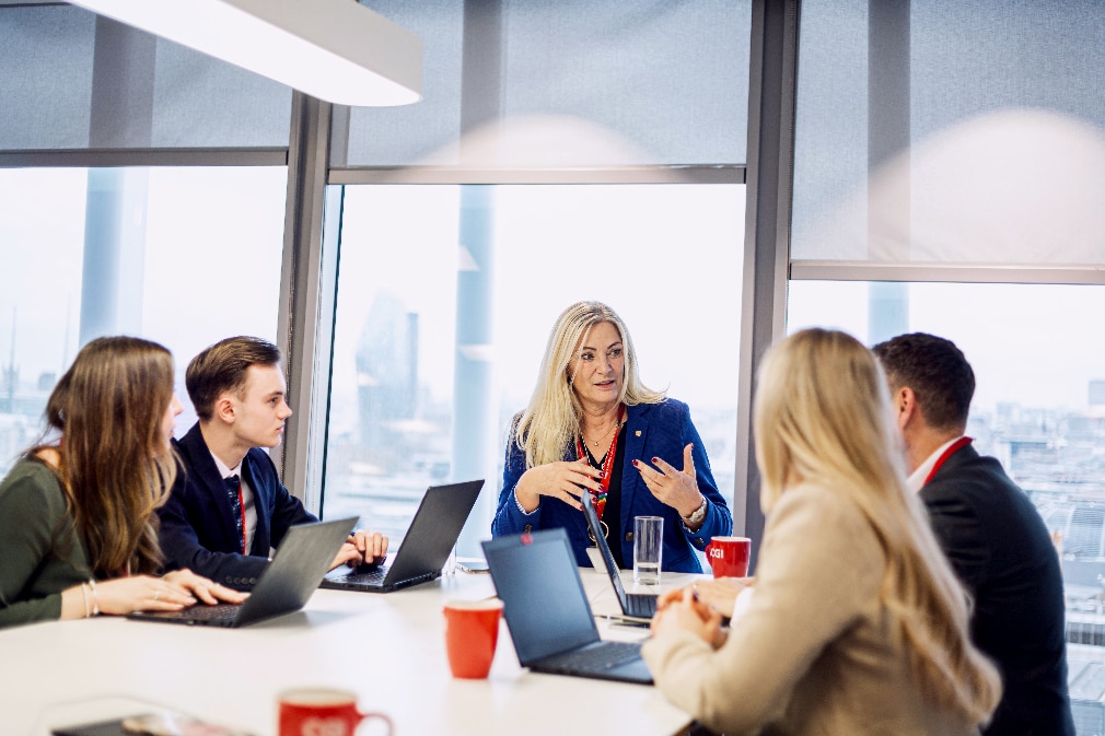CGI Partners talking around table CGI Partners talking around table