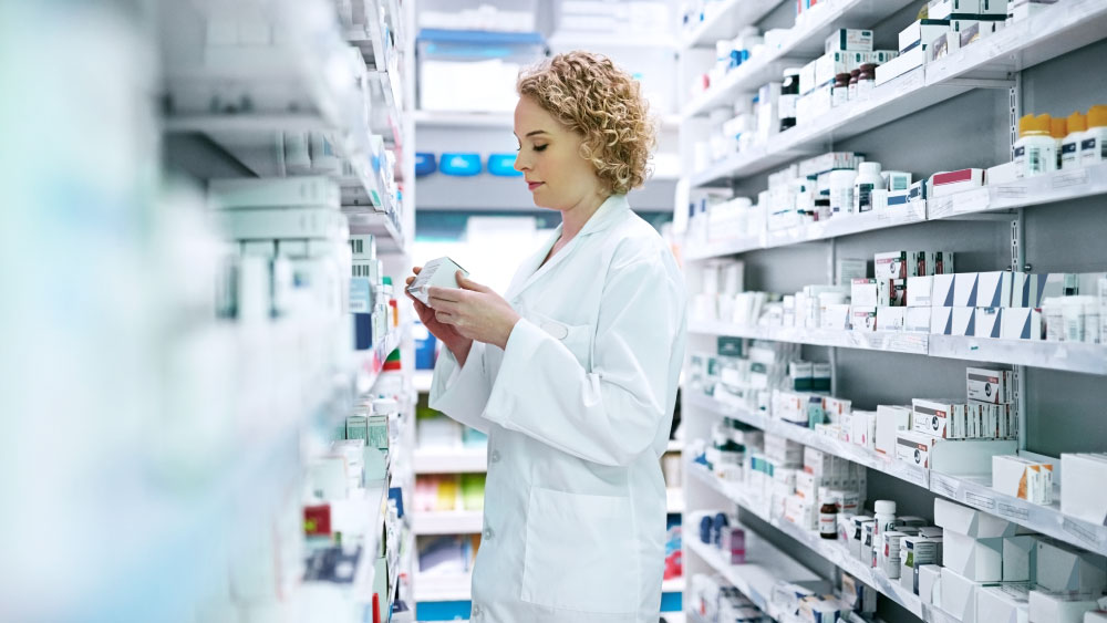 pharmacist sorting prescriptions