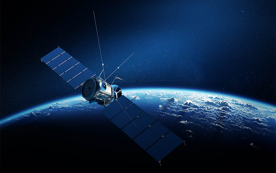 Communications satellite orbiting earth