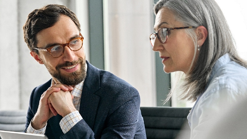 consultant and client discussing Voice of Our Clients