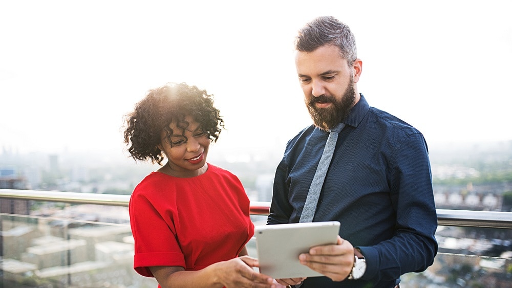 Consultants with a tablet