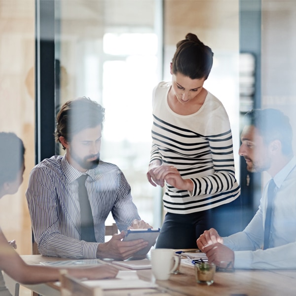 Consultants discussing data platform benefits