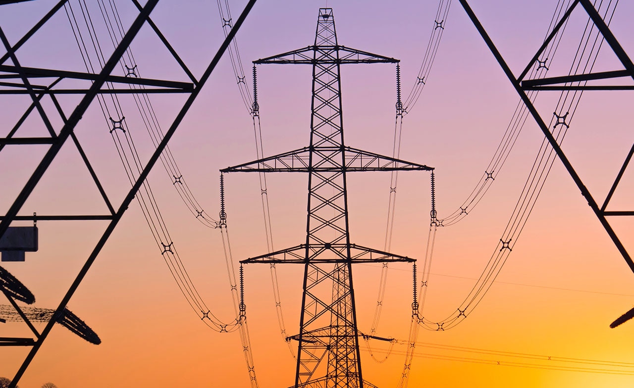 electricity pylon with sunset