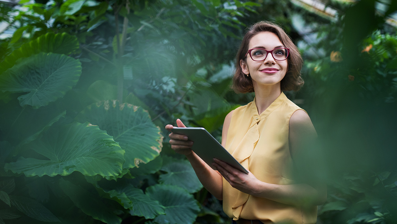 Researcher in a green house 