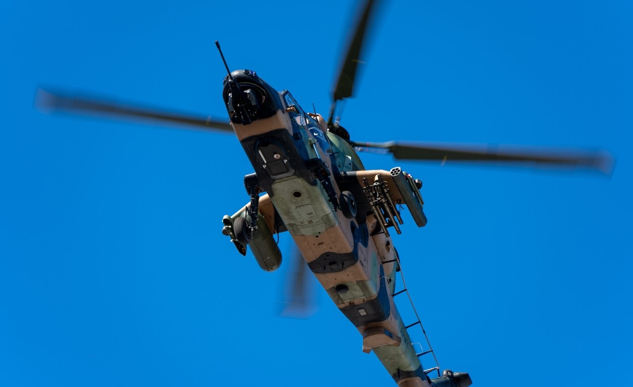 Military flypast on ANZAC Day in Darwin, Australia. Military flypast on ANZAC Day in Darwin, Australia.