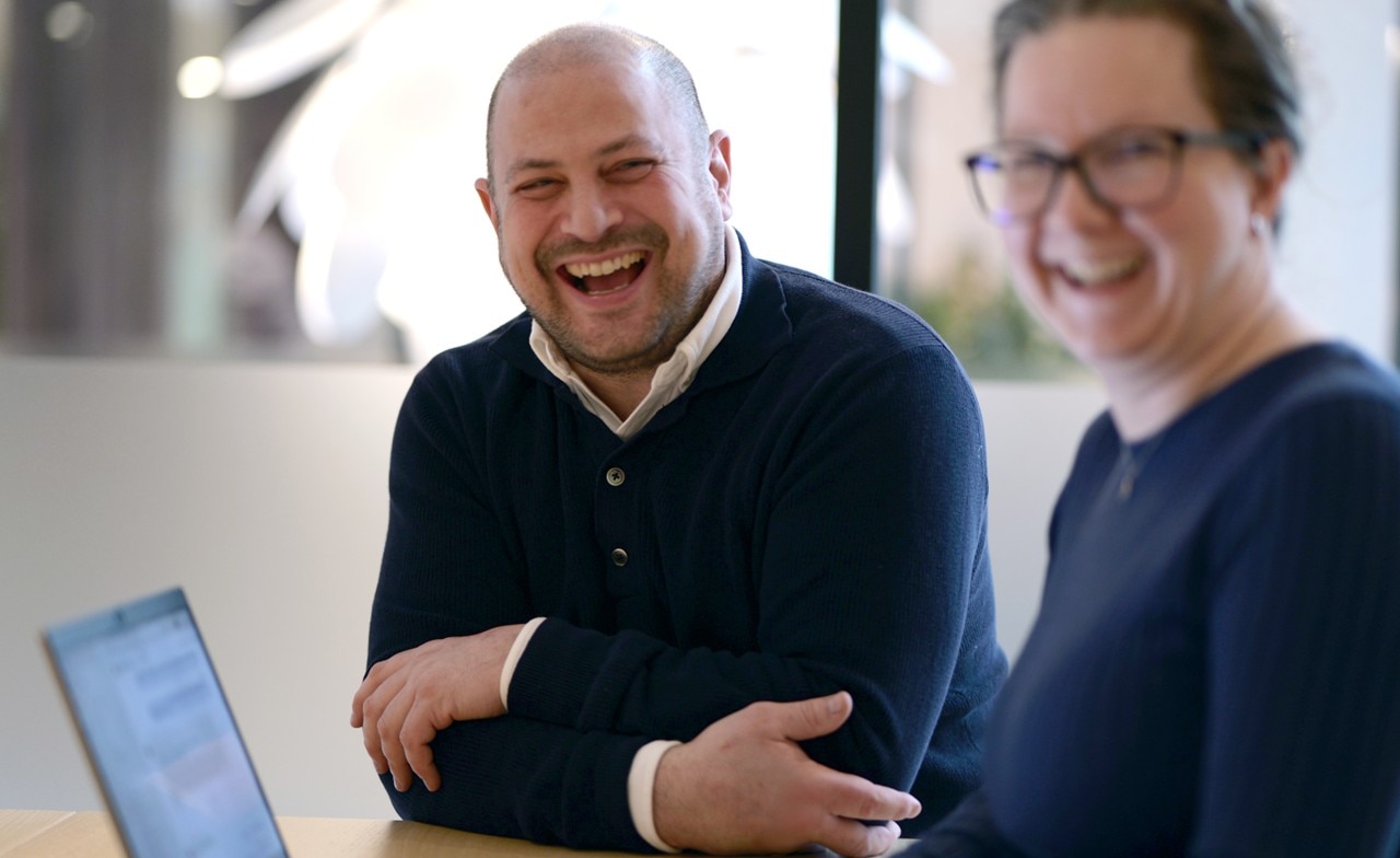Partners laughing together