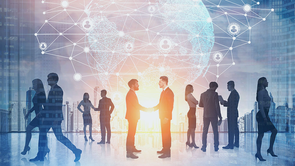 Business people shaking hands to signify partnership