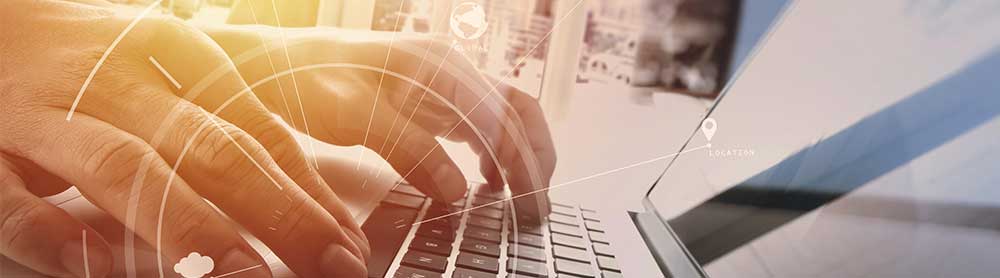 User with keyboard and monitor displaying business agility and digitization