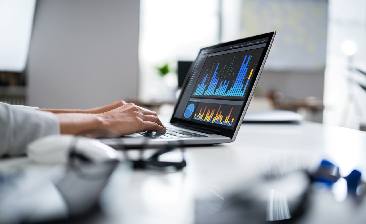 laptop featuring financial data