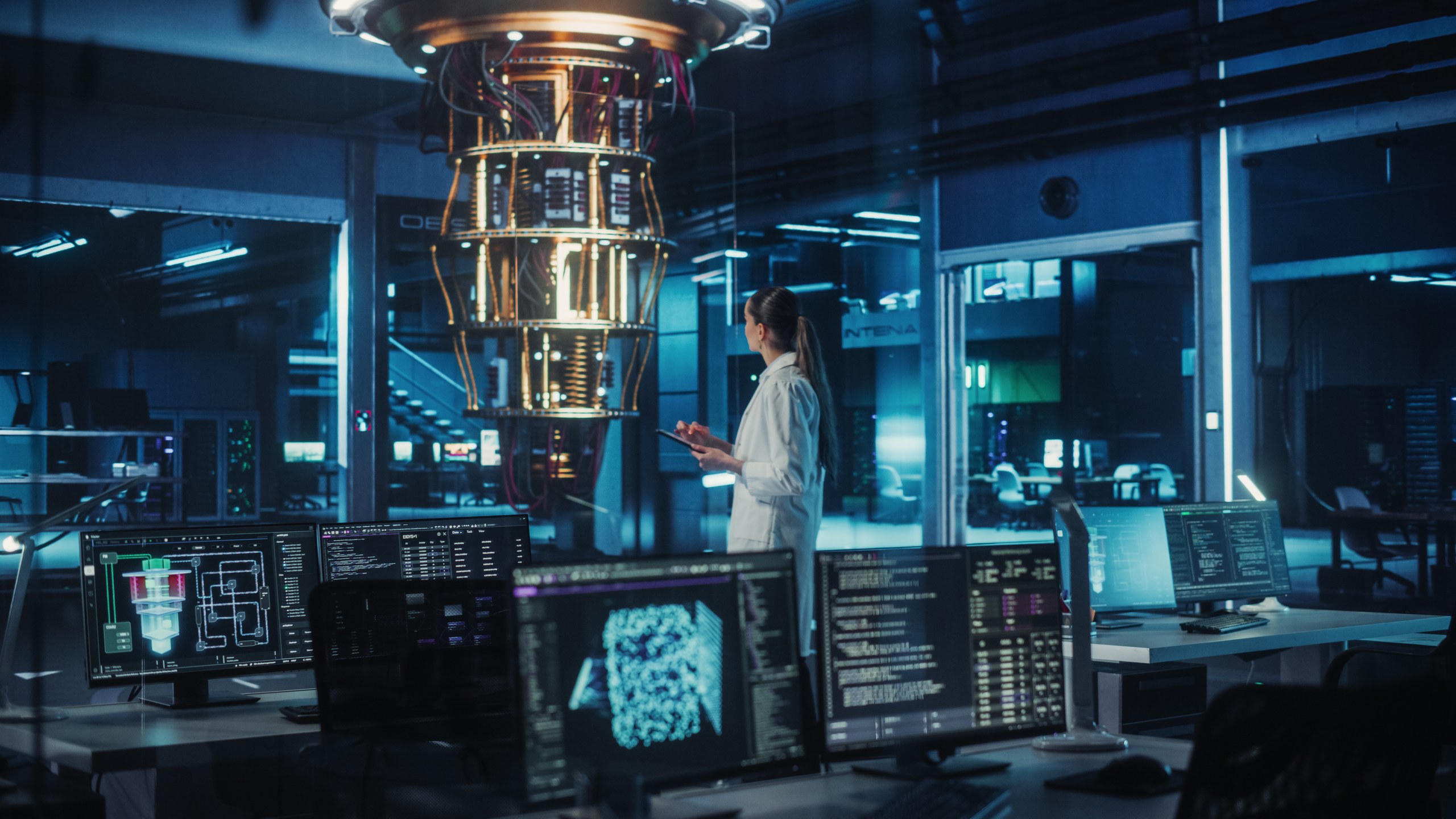 Scientist working with advanced computing systems in a life sciences data centre