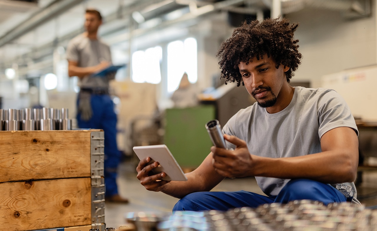 Man inspecting the quality in steel company