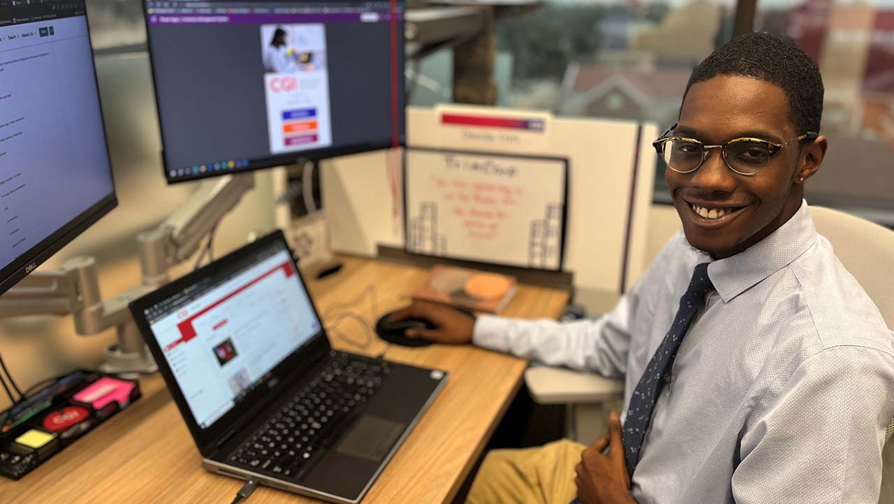 Deonta Trim serving as an intern in the CGI Lafayette US Onshore Delivery Center in 2023