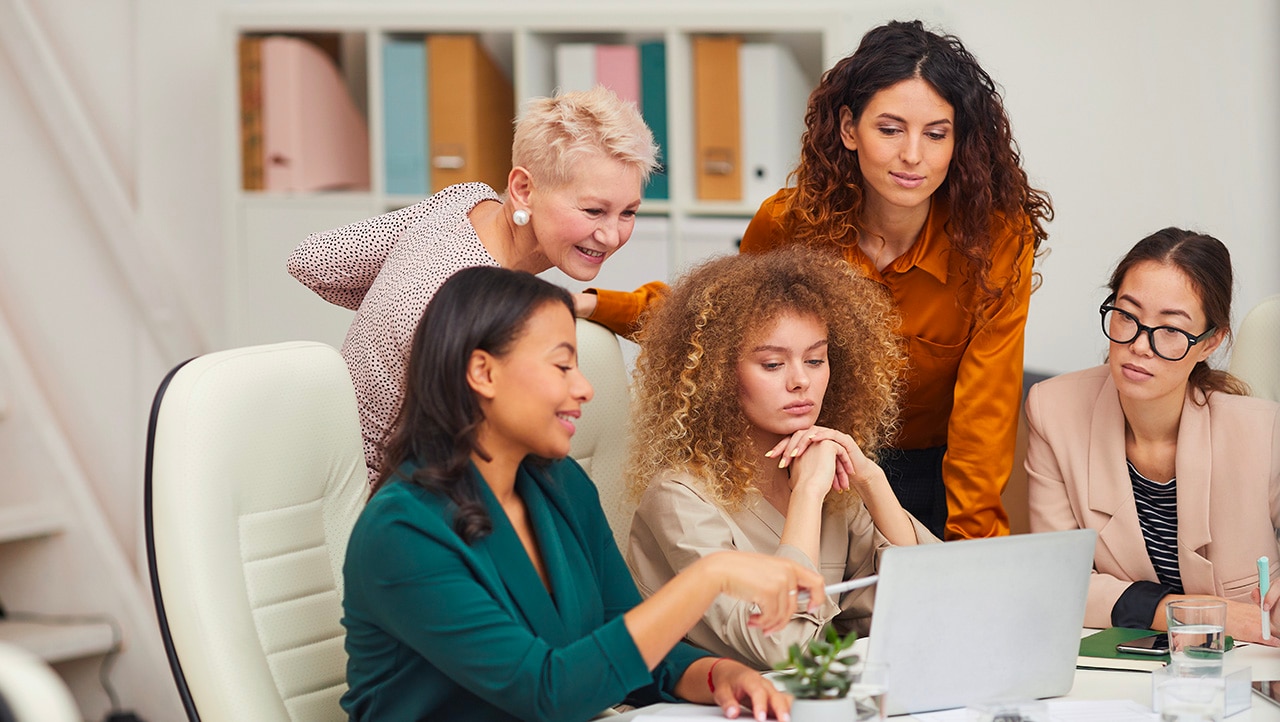 medium-women-working-together-on-a-computer image