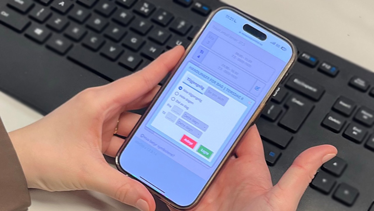 Nærbilde av WinTid app for telefon