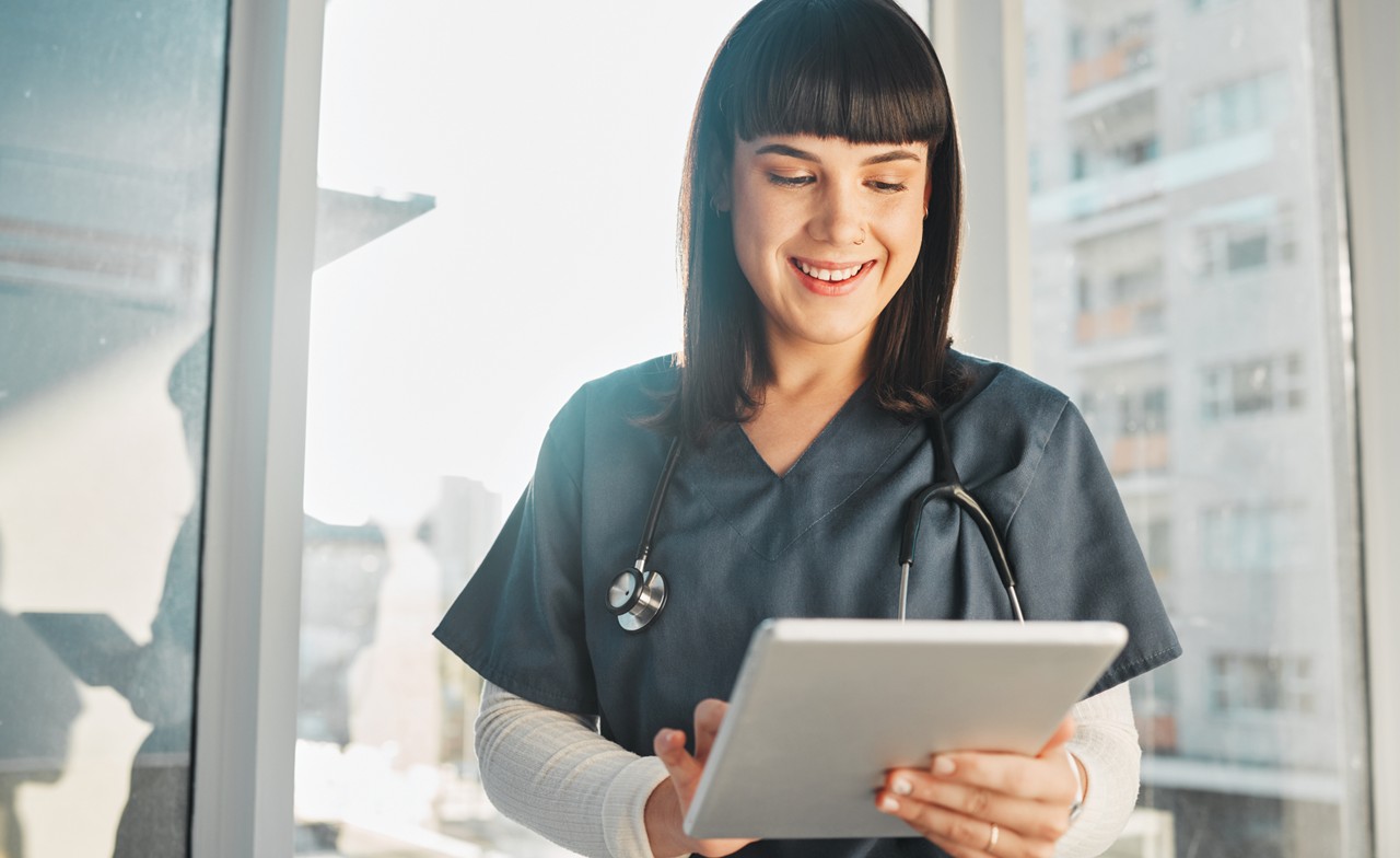 nurse with digital tablet device nurse with digital tablet device