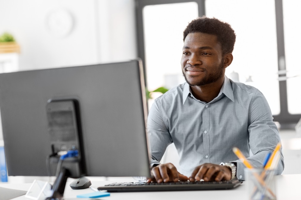 Person typing in desktop