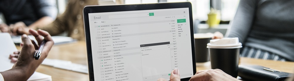 person-working-laptop-conference-room-mobile-340875227 Person working on a laptop in a conference room