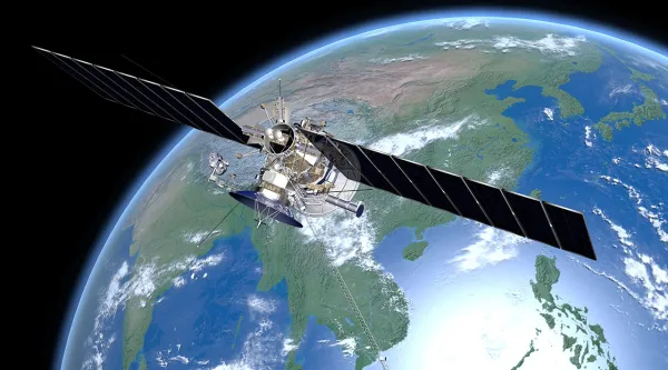 Satellite flying across Earth in Space