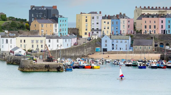 View of houses along the harbour front in Tenby, Wales