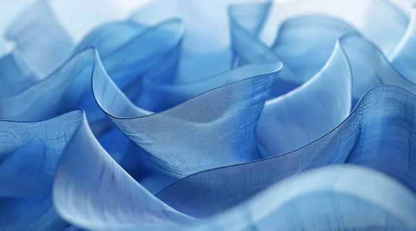 Tissu bleu translucide aux formes ondulées et fluides