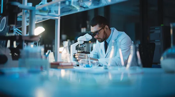 Specialists Working on Medicine, Biotechnology Research in Advanced Pharma Lab