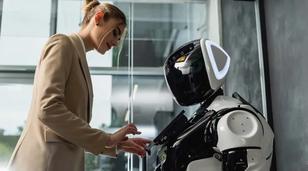 person interacting with AI robot