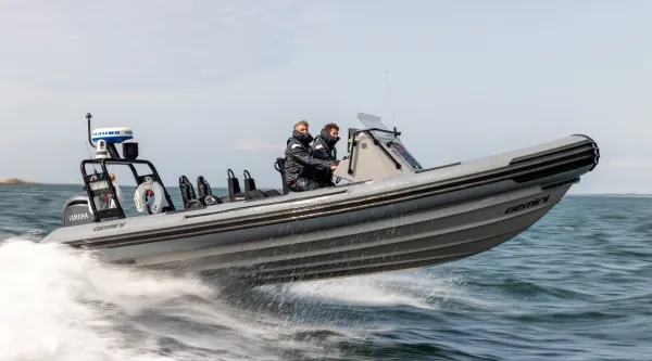 small high speed boat on water