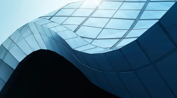 close up of blue glass on building