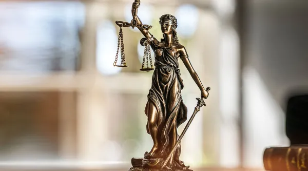 Small figure of Lady Justice