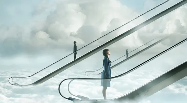Three professionals journeying up escalator into the clouds