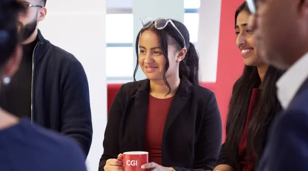 a group of people huddled in a circle