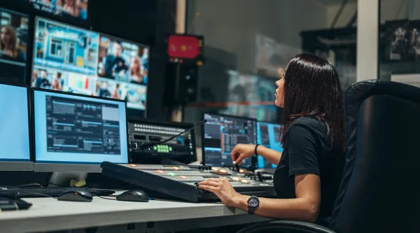 person working in broadcast control room