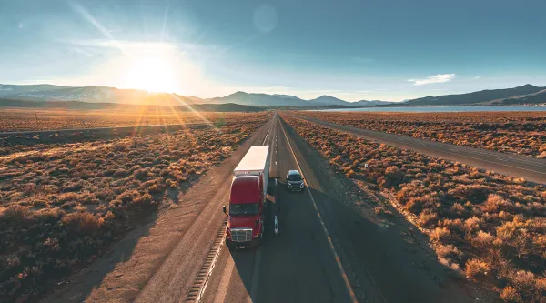 truck driving down the road