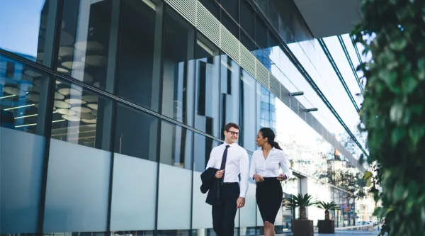 two colleagues walking