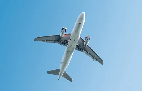 View of the underside of an airplane in flight