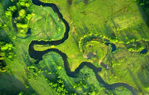 View of river and hillside from above