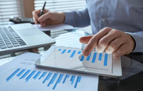 Businessman working with financial report charts