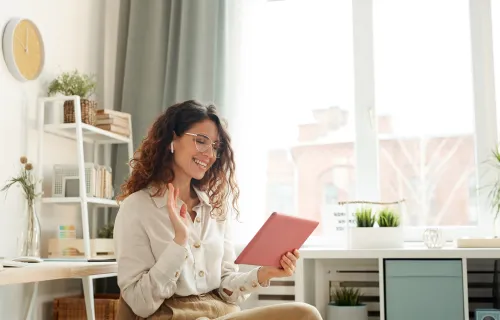 Happy woman using ServiceNow application
