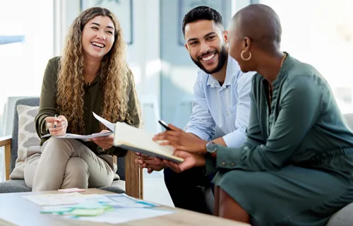 three professionals collaborating together 