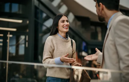 People talking and smiling