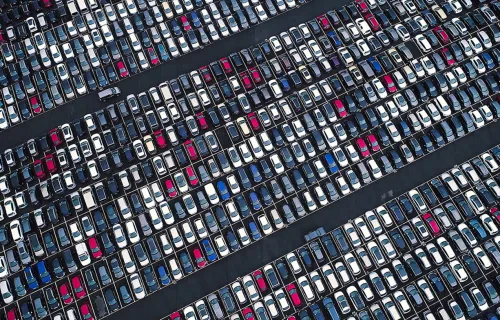 Aerial view of a large parking lot full of cars
