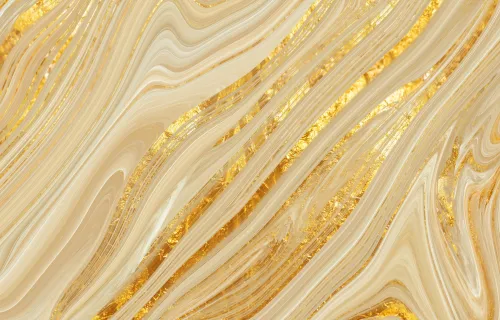 Abstract cream and gold swirls form a flowing, marbled pattern.